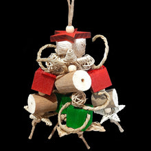Load image into Gallery viewer, This toy is packed with assorted soft and shreddable parts that will excite any bird this Christmas! The top is a small yucca button with a pine star on top. Hanging under it are four legs with 1" balsa cubes, sola chunks, vine stars, munch balls, seagrass cord, braided seagrass strips and little wood snap beads. Designed for small to intermediate sized birds that love soft, shreddable textures.