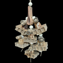 Load image into Gallery viewer, Cardboard honeycomb blocks, banana leaf rolls, mahogany chunks, uncolored pine wood slats and natural wood beads strung on jute cord. The base is a veggie tanned leather strap. Designed for intermediate up to medium sized birds that love soft textures to shred.