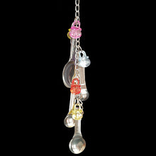 Load image into Gallery viewer, Four stainless steel measuring spoons with colorful acrylic charms linked on nickel plated chain with cool clip links on each end. This toy can be hung either horizontally or vertically in your bird's cage. Measures approx 11" including links.