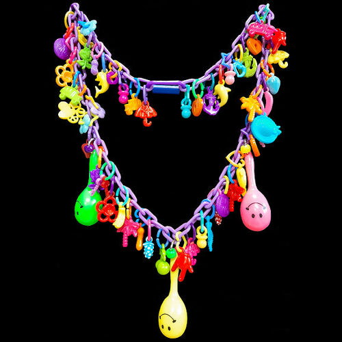 Does your bird love to play with your zipper, buttons or jewelry? If so, both of you will love this necklace made just for them! Designed to be worn around your neck so your bird can play while on you. Made with plastic chain, lots of charms and three min