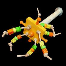 Load image into Gallery viewer, A 7-1/2 inch long (7/8" diameter) dowel perch with a spinning soft wood block filled with assorted beads knotted on veggie tanned leather and wood pegs for nibbling. A fun place for your bird to hang out and play at the same time!