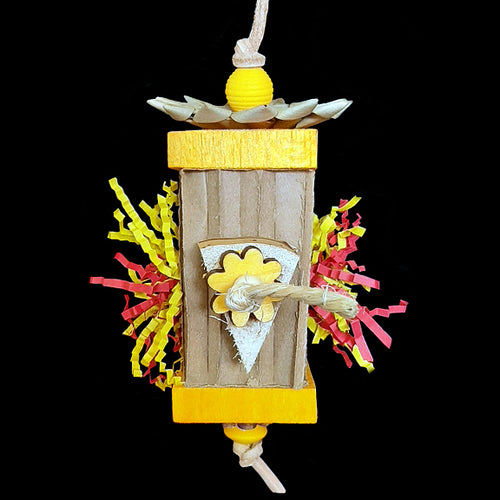 A bright & fun shredding toy made with a variety of different textures! The base is a cardboard honeycomb block with balsa, yucca, pine daisies, wood beads, crinkle cut paper shred, sisal rope and a palm leaf flower strung on veggie tanned leather lace. Designed for small to intermediate sized birds as well as bunnies.