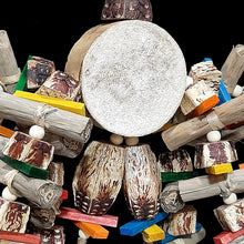 Load image into Gallery viewer, Your bird will think it's hit the jackpot with this toy! The base is a 3 - 3-1/2" yucca round with six arms of banana leaf rolls, mahogany chunks, brightly colored mini pine wood slats and wood snap beads strung on jute cord. At the bottom are two large mahogany pods with more pine slats and snap beads.