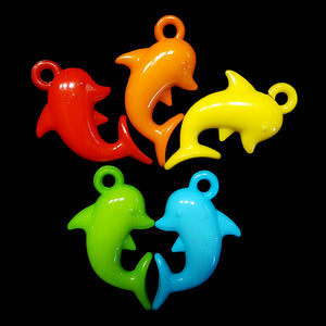Acrylic charms in the shape of a dolphin measuring approx 3/4" by 1-1/4" with a 3mm (approx 1/8") hole.  Package contains 10 charms in assorted colors.