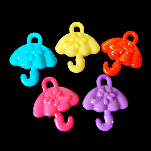 Small acrylic charms in the shape of an umbrella measuring approx 7/8