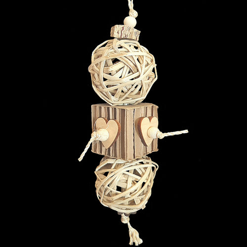Two giant bamboo balls with a corrugated paper honeycomb cube strung on sisal rope. Natural pine hearts, wood beads and a mahogany pod slice add extra texture for more chewing pleasure. Designed for birds as well as bunnies!