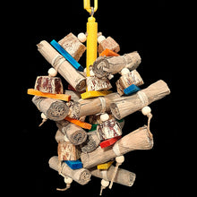 Load image into Gallery viewer, An exciting combination of easy to chew and shred banana leaf rolls, mahogany pod chunks, brightly colored mini softwood slats and small wood beads strung on jute cord from a wood base. Designed for small up to medium sized birds who love softer textures.
