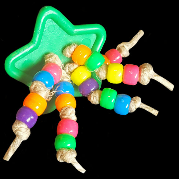 A giant soft plastic button with pony beads knotted on jute cord. Designed for all intermediate, medium and large birds. A top selling foot toy!!!