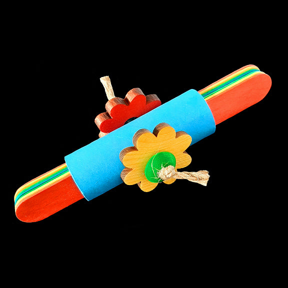 Giant craft sticks stuffed inside a cardboard bagel tube with pine daisies and little wood beads. Designed for mid-sized sized birds.  Measures approx 6