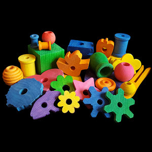 Over 1/2 lb of brightly colored assorted wood pieces drilled and ready for stringing. The shapes will vary with small, medium & large pieces. This is not junky or seconds wood - it's an assortment of the pieces we have in stock. Great for making toys for quakers and senegals up to african greys, small amazons, etc.