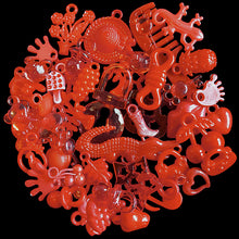 Load image into Gallery viewer, One half pound of mixed acrylic charms in assorted shapes and sizes. Mixture will consist of what we have in stock, so no two bags will be alike. Includes both solid and transparent (crystal) colors and many styles not shown on our website.
