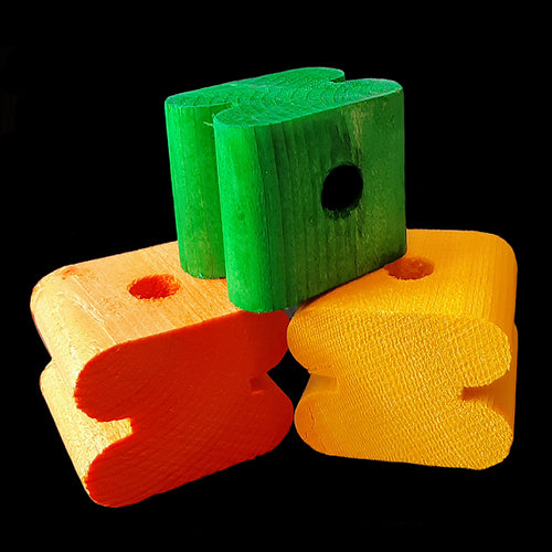 Brightly colored notched pine blocks measuring approx 1-1/4