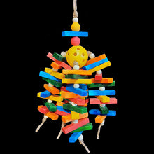 Load image into Gallery viewer, Almost five dozen brightly colored mini pine slats with wood snap beads threaded on jute cord on a perforated golf ball base. The perfect toy for conures that like to chew and hang on their toys!
