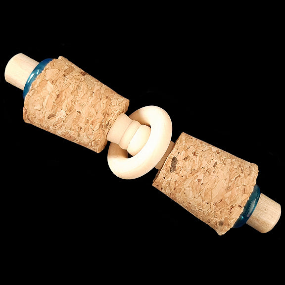 Cork stoppers, wood beads and a wood ring with colored acrylic rings on a paper lollipop stick make up this light weight foot toy designed for intermediate and medium sized birds that like softer textures. Can also be used as a cage top toy for small birds.  Measures approx 3-1/2