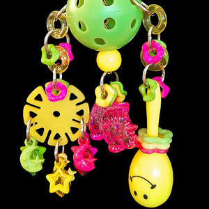 Lots of brightly colored acrylic charms and rings, a mini maraca, spin wheels and large crystal charm hanging from a perforated golf ball base with nickel plated hardware. This toy has lots of movement with many parts to shake and rattle! Designed for small to gentle intermediate sized birds. Available in assorted color combinations.  Hangs approx 8-1/2" including link.