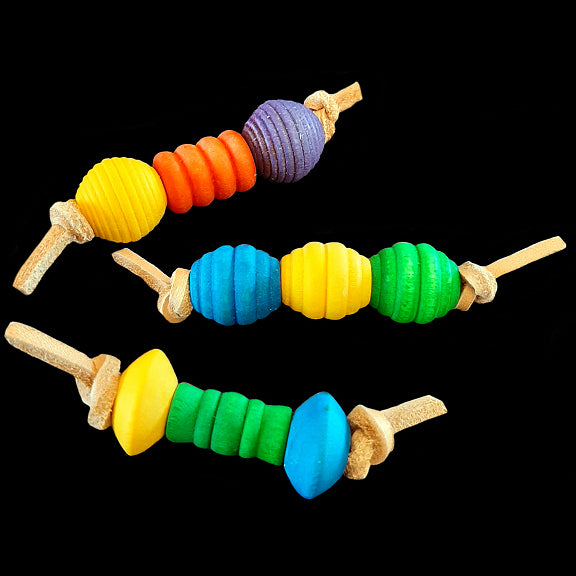 An assortment of small, lightweight foot toys made with colored wood beads strung on veggie tanned leather lace. Designed for small to intermediate birds. Each toy is approximately 3
