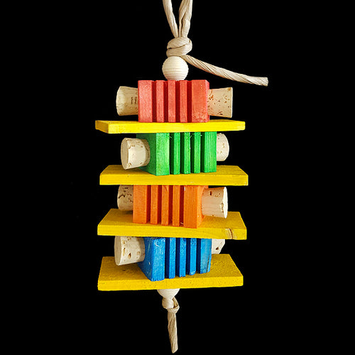 Four brightly colored notched pine blocks with cork stoppers inserted in the sides, four softwood slats and wood beads all strung on paper rope. Contains no metal parts.