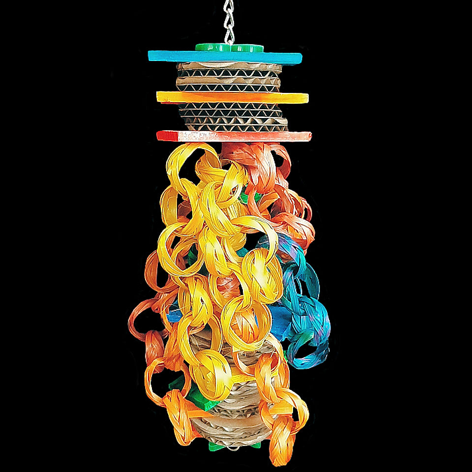 A great multi-textured toy with some wiggle and jiggle to it! Brightly colored pine slats, lots of cardboard rounds and bamboo chain strung on nickel plated chain. Designed for lighter chewers. Can also be hung from end to end to form a bridge toy.