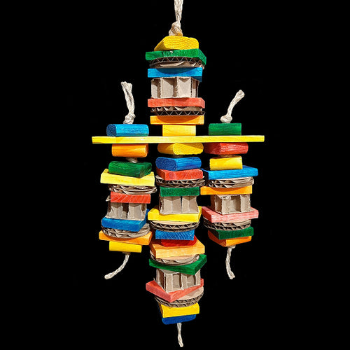 A great toy for intermediate and medium sized birds who like to destroy! Made with layers of cardboard washers, cardboard honeycomb blocks and brightly colored pine slats and pine wafers. Strung on heavy jute cord.

Measures approx 6-1/2