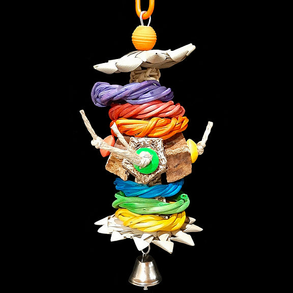 Brightly colored vine rings, palm leaf flowers, mahogany pods and wood beads on a vine twist base finished off with a nickel plated bell. Built on stainless steel wire.  Measures approx 3