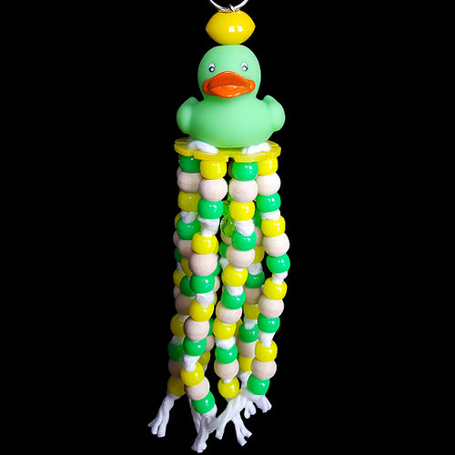 A combination of pony beads and little wood snap beads knotted on cotton cord under a little rubber duck with a charm hidden inside. Available in assorted color combinations