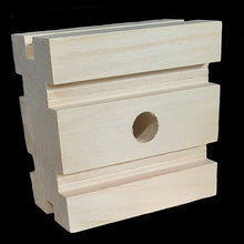 Load image into Gallery viewer, Natural, uncolored pine wood blocks measuring 3&quot; by 3&quot; by 1-3/4&quot; with a 1/2&quot; hole. The blocks are grooved making them perfect for birds who do not chew on large blocks. Recommended for medium to large birds.
