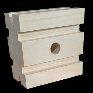 Natural, uncolored pine wood blocks measuring 3" by 3" by 1-3/4" with a 1/2" hole. The blocks are grooved making them perfect for birds who do not chew on large blocks. Recommended for medium to large birds.