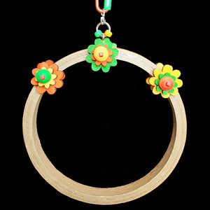 A cute swing made with a birdie bagel base and brightly colored pine daisies. Designed for intermediate sized birds such as senegals, caiques, ringnecks, quaker parrots, etc.