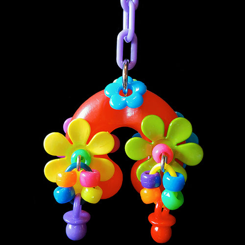 Spinning flowers, pony beads and mini pacifiers on a puffy plastic horseshoe hanging on plastic chain.  Hangs approx 6