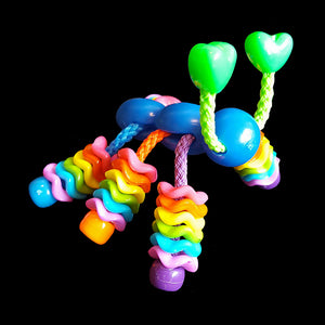 A plastic bug with paulie rope legs filled with wiggle rings and pony beads. Designed for intermediate to medium birds.  Measures approx 3" by 3".