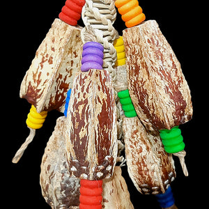 Easy to chew natural mahogany pods and colored wood beads threaded on a vine twist roller base. Stringing material is jute cord. This toy contains no metal parts. Designed for intermediate sized birds as well as medium birds who are light chewers.  Measures approx 4" by 12" including clip.
