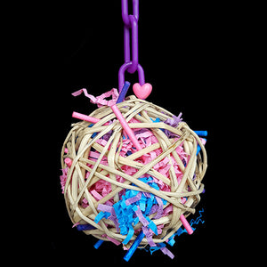 A 3-1/2" vine ball stuffed full of colored paper shred & lollipop sticks. Extra treats can be hidden in the ball for even more foraging fun! Contains no metal parts.