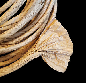 1/4" rope made with natural twisted kraft paper. Great for paper lovers . . . leave twisted or unravel and fray out into paper ribbon. Use for toys of all sizes.