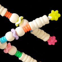 Load image into Gallery viewer, Lightweight foot toys made for the little guys with wood and plastic beads on a paper lollipop stick. Designed for small conures, cockatiels, quakers and other birds that like small handheld toys.
