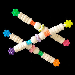 Lightweight foot toys made for the little guys with wood and plastic beads on a paper lollipop stick. Designed for small conures, cockatiels, quakers and other birds that like small handheld toys.
