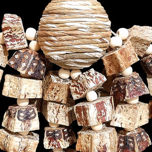 Eight strands of hemp cord filled with mahogany chunks and little wood snap beads dangling from a sola rope ball center. Designed for small to intermediate sized birds.