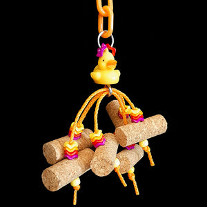 Six 2 inch corks and a handful of wiggle rings & pony beads strung on paulie rope hanging under a little duck.  Measures approx 8" including plastic chain and link.