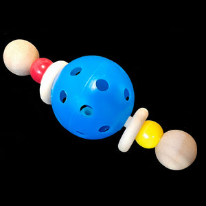 A perforated golf ball filled with little beads with wood rings and acrylic beads on a wood dowel capped off with hardwood balls. Recommended for intermediate to medium sized birds.  Measures approx 4-1/2".