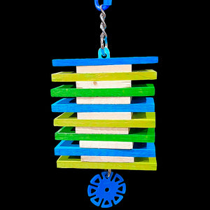 A combination of large softwood slats and pine chippers threaded on a plastic craft stick base. This toy can easily be refilled by simply opening one of the o-rings and sliding more wood onto the base. Available in assorted colors.  Measures approx 3-1/2" wide by 8-1/2" including link.