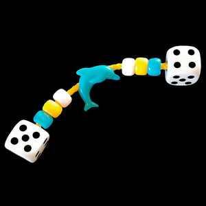 Assorted acrylic beads that slide back and forth on paulie rope between a pair of dice. Designed for intermediate to medium sized birds. Various color combinations available.  Measures approx 4" long. 