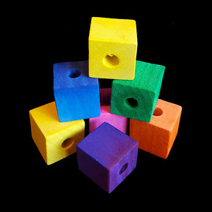 Brightly colored hardwood cubes measuring approx 3/4" with a 5/16" hole.
