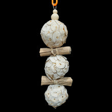Load image into Gallery viewer, Two of our most popular shreddable parts made into a toy! Three super soft sola balls with crunchy banana leaf rolls stacked on stainless steel wire and topped off with wood beads. Designed for small birds up to intermediate sized birds who love shredding soft textures.

