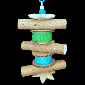 Another great multi-textured toy for the beaks that love softer materials! Sola sticks (similar to balsa), brightly colored loofah slices, cardboard rounds, palm leaf stars and wood beads strung on stainless steel wire. Designed for small to intermediate birds from budgies, lovebirds and conures up to cockatiels, ringnecks and quakers or bigger birds that love to shred!  Measures approx 4-3/4" by 10" including link.