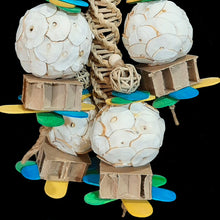 Load image into Gallery viewer, Shredder bird toy handmade with sola atta balls, mini vine balls, honeycomb blocks and thin wood paddles on a vine twist base.
