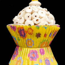 Load image into Gallery viewer, A super soft sola atta ball nestled inside colorful paper cupcake liners with a cork stopper hidden under the bottom liners. Strung on stainless steel wire with a plastic straw bead, wood beads and small nickel plated bell at the bottom. Designed for small birds such as parrotlets, budgies, small conures, cockatiels, etc. Available in assorted colors.  Measures approx 3&quot; by 8&quot; including link.

