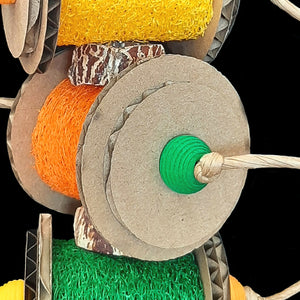 Three brightly colored loofah rolls flanked by corrugated cardboard rounds with wood beads, mahogany chunks and paper rope. The base of this toy is stainless steel wire. Designed for small to intermediate birds who like softer textures.  Measures approx 4" by 11" including link.