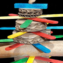 Load image into Gallery viewer, Bird toy made with popsicle sticks, cardboard rounds and a natural sola stick with bark stacked together on paper rope. Designed for small birds or intermediate sized birds that need to be encouraged to chew and play.
