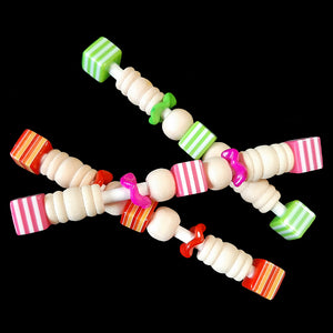 Light-weight foot toys made for the little guys with wood beads, wiggle rings and acrylic allsort beads on a rolled paper lollipop stick. Designed for small conures, cockatiels, quaker parakeets and other like-sized birds that enjoy handheld toys. Each toy measures approx 3-1/2".   Package contains 3 toys in assorted color combinations.
