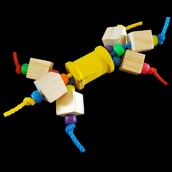 Little wood cubes & pony beads running through a colored wood spool with paulie rope. Designed for intermediate to medium birds.  Measures approx 4