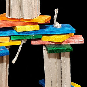 Lots of brightly colored softwood slats in different sizes with cardboard honeycomb blocks strung on jute rope. This toy has a lot of movement! Designed for intermediate to medium sized birds that like softer textures as well as bunnies and other rodents.